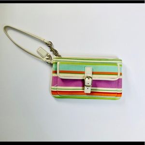 Coach wristlet with pastel stripes